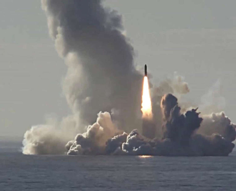 A missile firing from the sea