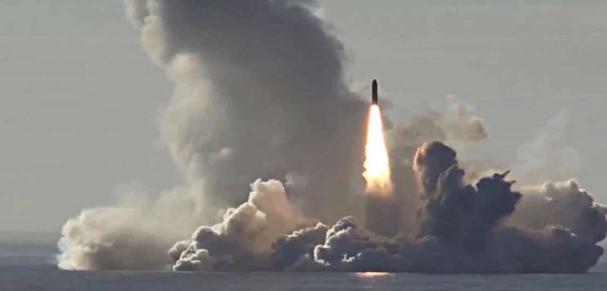 A missile firing from the sea